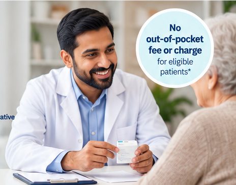 Pharmacist discussing medicines with an older patient at home